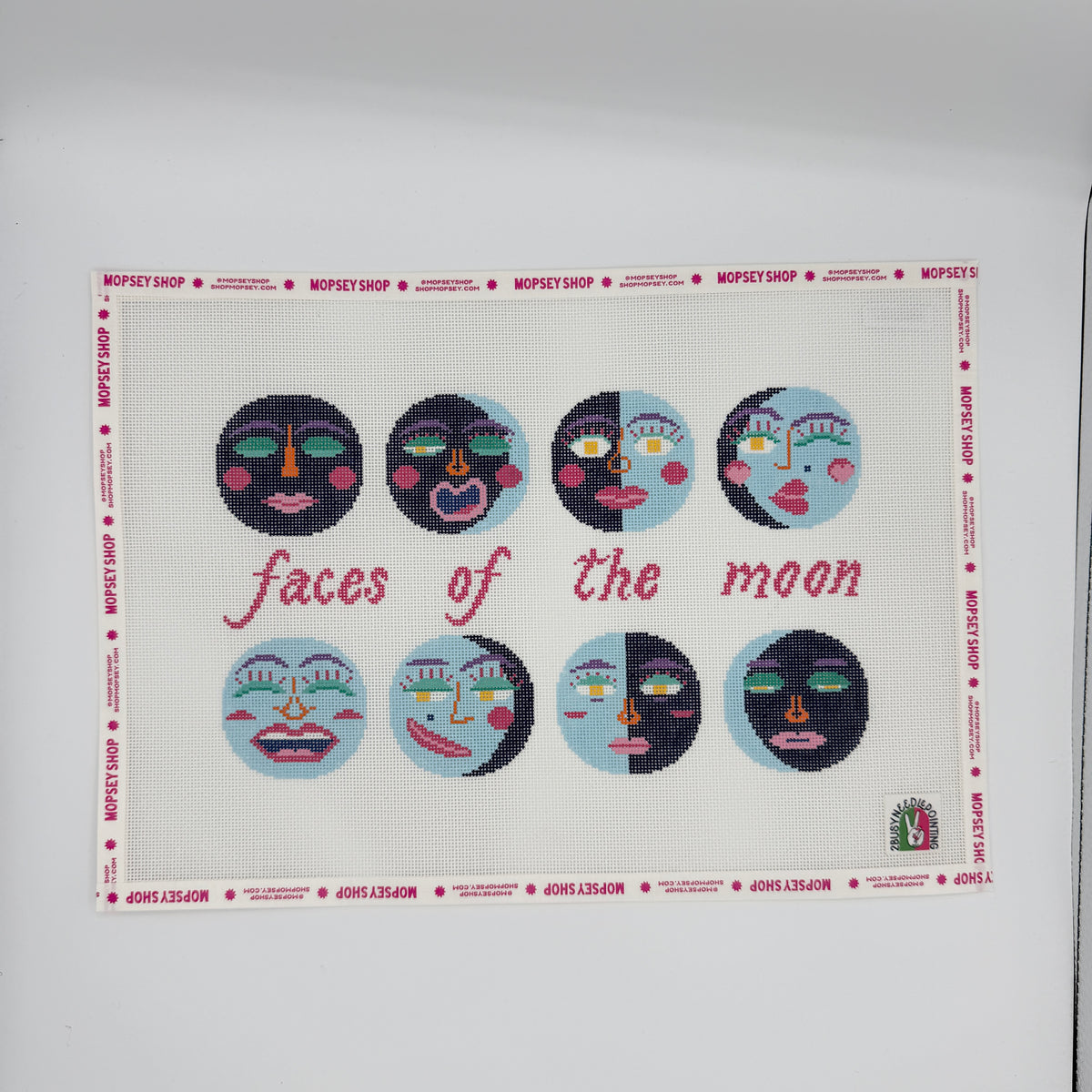2 Busy-Needlepointing: Faces of the Moon